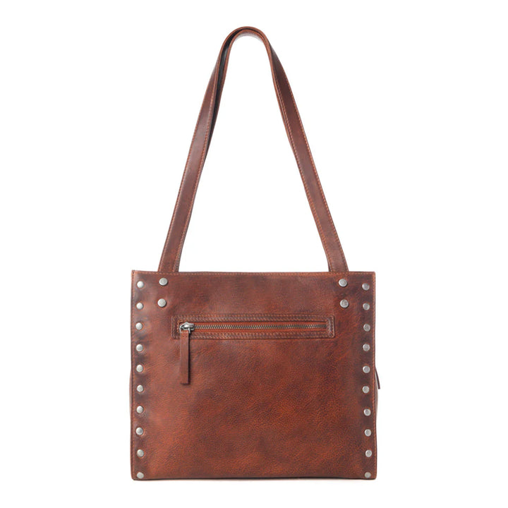 Brown leather tote bag with studs on a white background