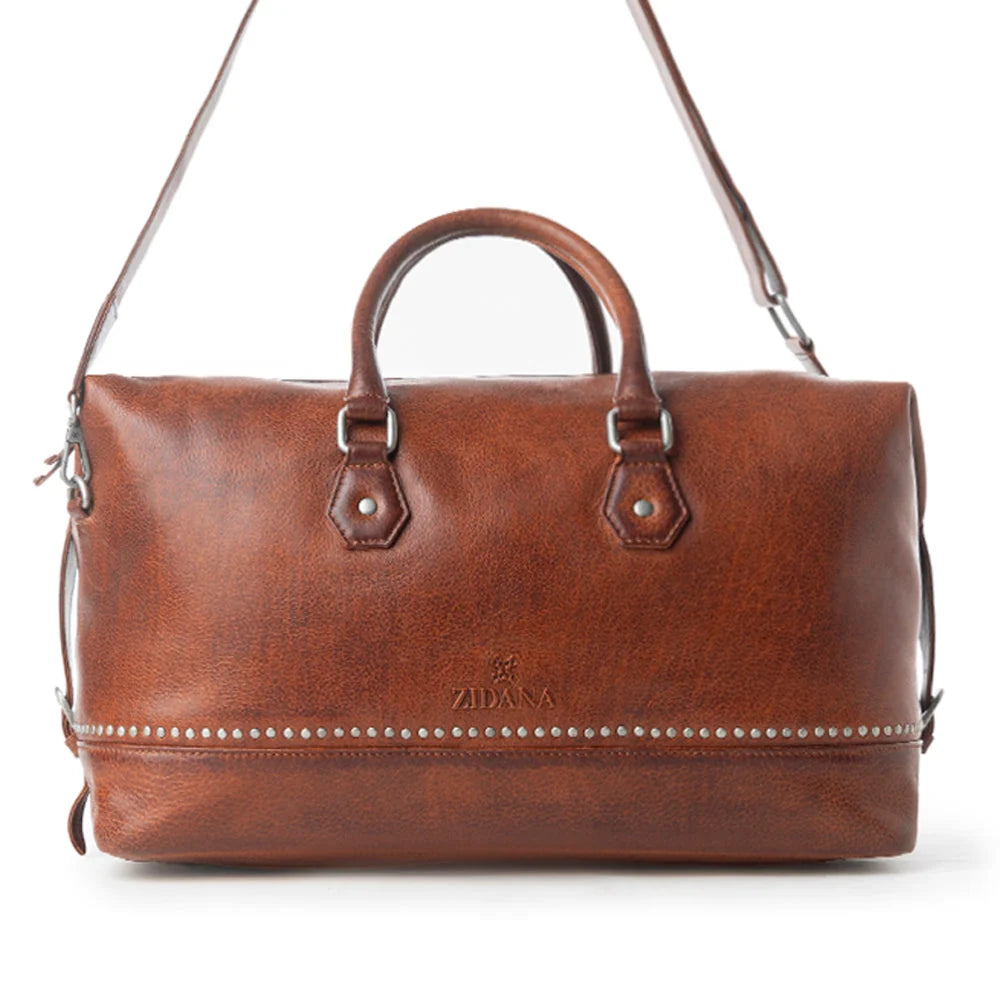 Myra Zidana Sundown Plains Veg Tanned Leather Traveller Bag In Auburn Ember